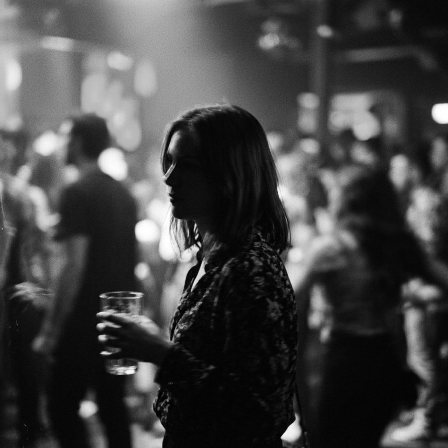 Bad pola: blurry backlit profile at a party